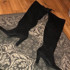 Size 8 1/2 over the knee black boots.